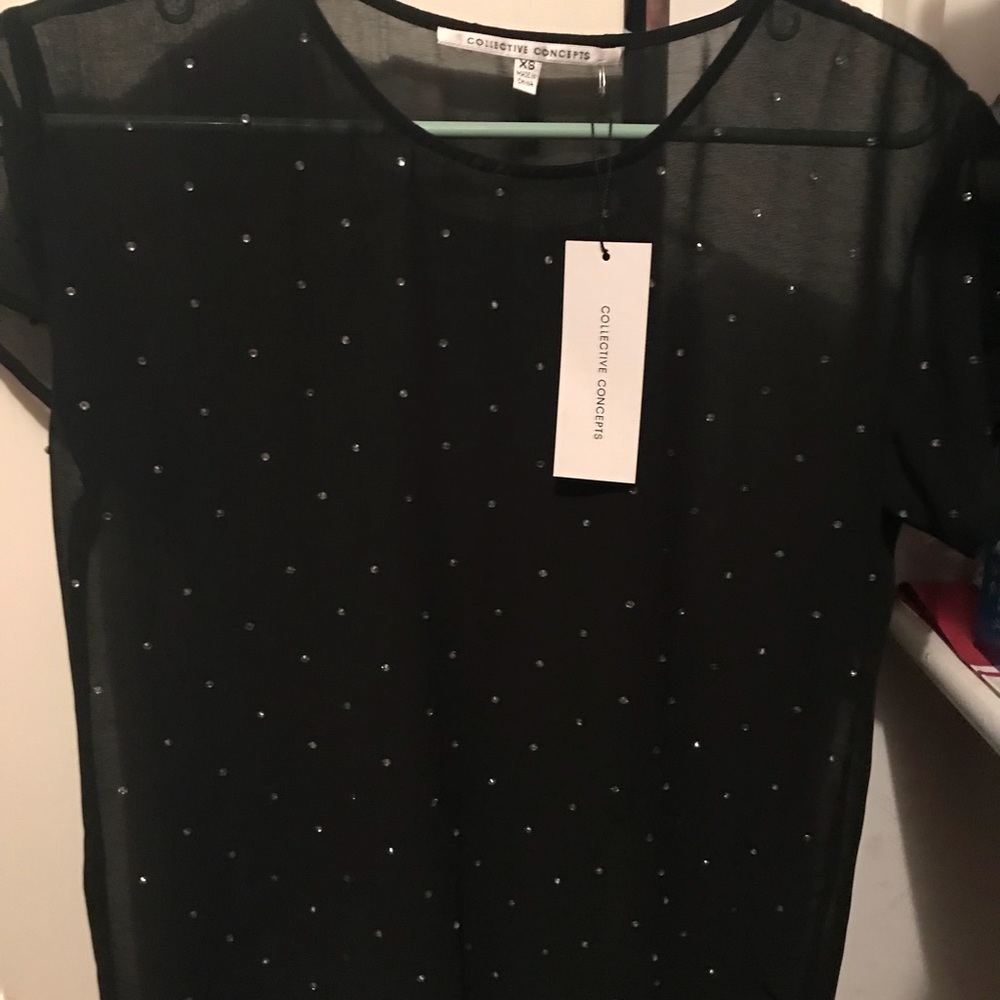 Sheer black top with Finestone detail